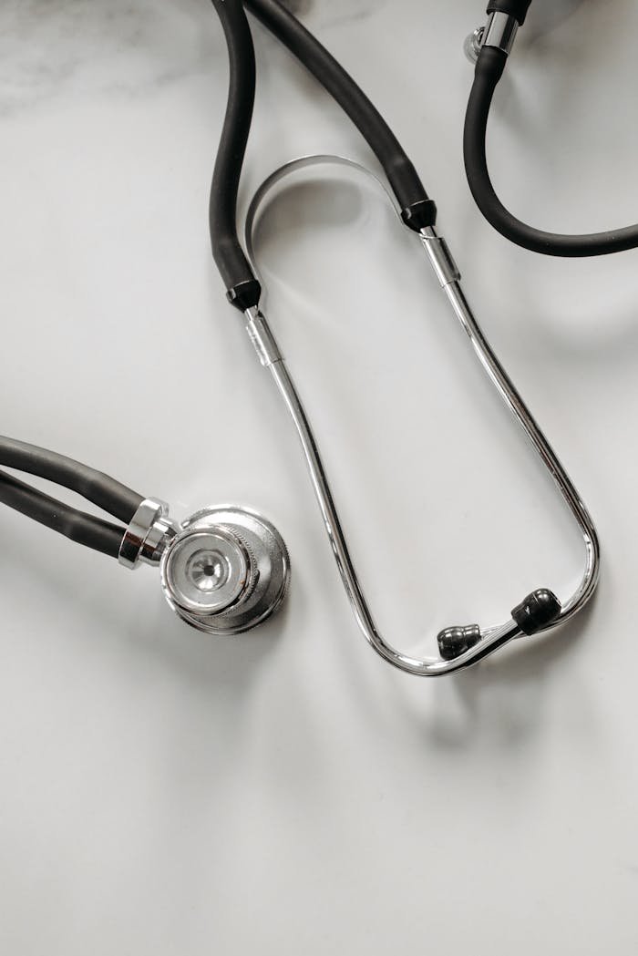 A detailed image of a stethoscope on a white background, ideal for healthcare themes.